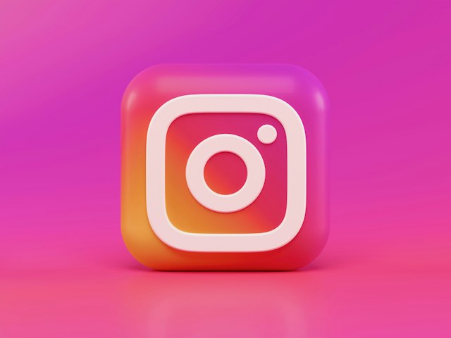 Colourful Instagram icon illustration on a pink background