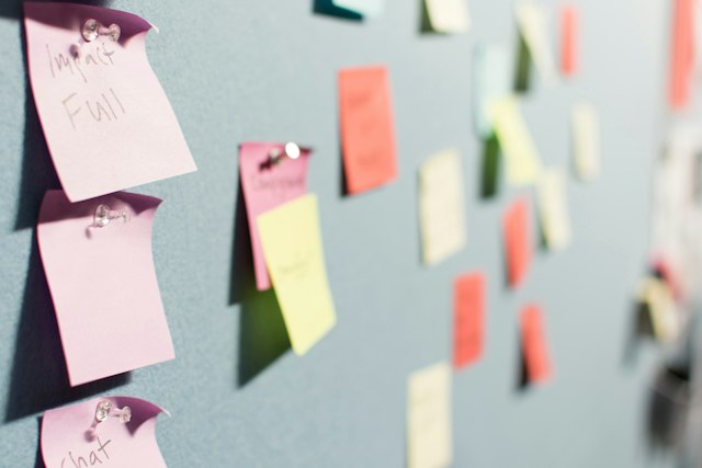 Colourful sticky notes arranged on a planning board